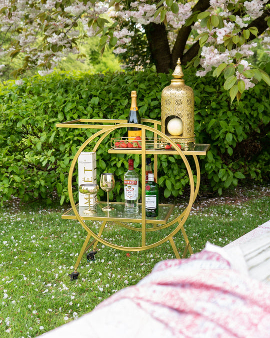 Entertaining Elegance: The Round Art Deco Gold Drinks Trolley Awaits Summer Soirees