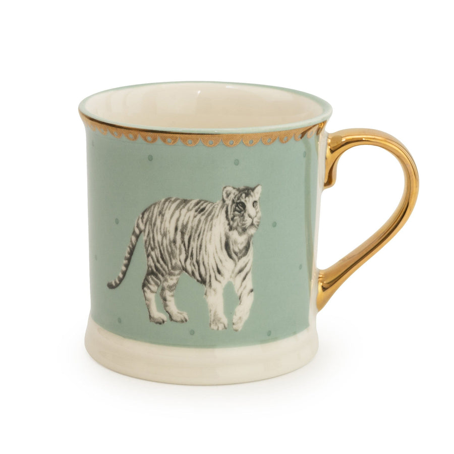 A teal tankard mug with a vivid tiger stripe pattern wraps around the exterior, paired with a sturdy, comfortable handle for a bold kitchen statement.