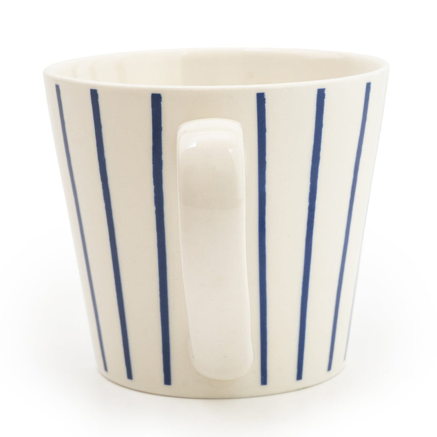 Blue and white striped ceramic wide mug with nautical design, sturdy handle, on a light wooden table background.