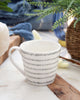 Wide mug with a serene nautical theme, featuring subtle grey dashes that mimic gentle ocean waves, against a classic white background suitable for a cozy, maritime-inspired kitchen.