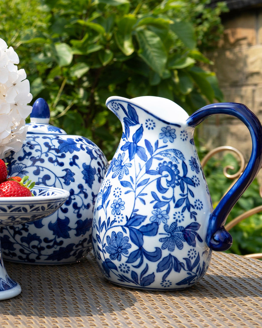 Elegant Oriental blue and white porcelain jug with intricate patterns, ideal for a sophisticated homeware addition or as a classic decorative piece.