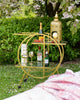 Round Art Deco Gold Drinks Trolley with Two Rectangular Glass Shelves & Handle